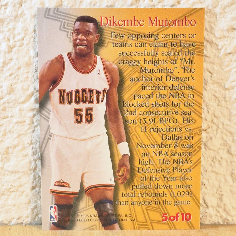1995-96 FLEER METAL DIKEMBE MUTOMBO STEEL TOWER INSERT CARD #5 DENVER NUGGETS