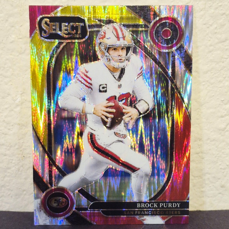 2024 PANINI SELECT BROCK PURDY RED AND YELLOW CLUB LEVEL SHOCK PRIZM #226